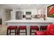 Bright, updated kitchen featuring stainless steel appliances, white cabinets, and a quartz countertop island at 7318 S Mcallister Ave, Tempe, AZ 85283