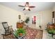 Comfortable living room features eclectic decor and a view into the dining room at 7318 S Mcallister Ave, Tempe, AZ 85283