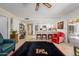 Open-concept living room connects to the kitchen and features barstool seating and a colorful rug at 7318 S Mcallister Ave, Tempe, AZ 85283
