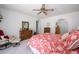 Spacious main bedroom features neutral carpet, patterned bedspread and furnishings at 7318 S Mcallister Ave, Tempe, AZ 85283