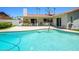 Bright pool view with pool steps and view of outdoor seating area with roof coverage at 7318 S Mcallister Ave, Tempe, AZ 85283