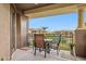 Spacious balcony featuring a table with chairs and providing scenic views of the surrounding neighborhood at 7601 E Indian Bend Rd # 3002, Scottsdale, AZ 85250
