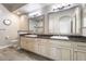 Bright bathroom featuring double sinks, granite countertops, and walk-in shower at 7601 E Indian Bend Rd # 3002, Scottsdale, AZ 85250