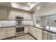 Well-equipped kitchen with stainless steel appliances, sleek countertops, and modern finishes, perfect for culinary enthusiasts at 7601 E Indian Bend Rd # 3002, Scottsdale, AZ 85250