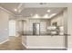 Modern kitchen with granite countertops, stainless steel appliances, and ample cabinet space, perfect for cooking at 7601 E Indian Bend Rd # 3002, Scottsdale, AZ 85250