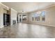 Bright and airy living space featuring a fireplace, balcony access, and plenty of natural light at 7601 E Indian Bend Rd # 3002, Scottsdale, AZ 85250