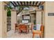 Outdoor grilling area with pergola, providing a perfect spot for barbecues and outdoor entertaining at 7601 E Indian Bend Rd # 3002, Scottsdale, AZ 85250