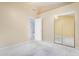 Neutral bedroom with carpet and closet space and a bathroom through an open doorway at 786 S Catalina St, Gilbert, AZ 85233