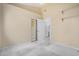 Cozy carpeted bedroom with mirrored closet and ample natural light at 786 S Catalina St, Gilbert, AZ 85233