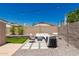 Inviting backyard with patio furniture, stylish pavers, and ample space for outdoor relaxation at 902 E Wahalla Ln, Phoenix, AZ 85024
