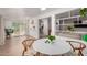 Open dining area with modern furnishings and seamless flow to the living spaces at 902 E Wahalla Ln, Phoenix, AZ 85024