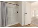 Bathroom showcasing a new shower with neutral shower curtain and modern fixtures at 9735 W Altadena Dr, Casa Grande, AZ 85194