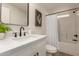Modern bathroom featuring quartz countertop, matte black fixtures, and plant accents at 9735 W Altadena Dr, Casa Grande, AZ 85194