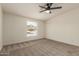 Bright bedroom filled with natural light, neutral carpet and desert views at 9735 W Altadena Dr, Casa Grande, AZ 85194