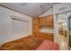Bright bedroom with closet and wood cabinets at 111 S Greenfield Rd # 405, Mesa, AZ 85206