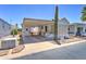 Charming manufactured home with covered parking and well-maintained desert landscaping in a vibrant community at 111 S Greenfield Rd # 405, Mesa, AZ 85206