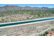 Spacious desert neighborhood with mountains and waterway, perfect for those seeking natural beauty at 11217 E Laurel Ln, Scottsdale, AZ 85259