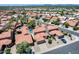 An aerial shot of a residential neighborhood with beautiful homes and a community pool surrounded by trees at 11217 E Laurel Ln, Scottsdale, AZ 85259