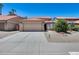 Charming single-story home with a well-maintained yard, two-car garage, and inviting curb appeal at 11217 E Laurel Ln, Scottsdale, AZ 85259