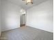 Neutral bedroom with a large archway leading to the rest of the home at 11534 E Downing St, Mesa, AZ 85207