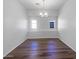 Bright dining room featuring modern chandelier lighting and wood flooring at 11534 E Downing St, Mesa, AZ 85207