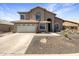 Beautiful two-story home featuring a two car garage and low maintenance desert landscaping in front yard at 11534 E Downing St, Mesa, AZ 85207