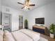 Relaxing bedroom features neutral walls and a ceiling fan and decorative bureau with TV at 11534 E Downing St, Mesa, AZ 85207