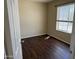Bedroom with modern flooring and neutral wall paint at 1212 W Glenmere Dr, Chandler, AZ 85224