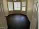 Cozy bedroom with modern flooring and natural light from windows at 1212 W Glenmere Dr, Chandler, AZ 85224