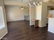 Spacious living and dining area featuring an open layout and modern flooring at 1212 W Glenmere Dr, Chandler, AZ 85224