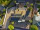 Aerial view of home with solar panels, hot tub, desert landscaping, and inground pool at 13034 N 8Th Ave, Phoenix, AZ 85029