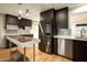 Updated kitchen with modern appliances, stone countertops, and sleek cabinetry at 13034 N 8Th Ave, Phoenix, AZ 85029