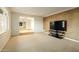 Bright living room with neutral carpet and views to the other rooms at 13034 N 8Th Ave, Phoenix, AZ 85029