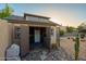 A well-organized shed with open doors in a backyard featuring desert landscaping and clear skies at 13034 N 8Th Ave, Phoenix, AZ 85029