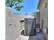 View of AC unit on home's exterior, illustrating maintenance access at 1417 E Marshall Ave, Phoenix, AZ 85014