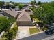 Aerial view of a single-Gathering home with a spacious driveway and well-maintained landscaping at 1417 E Marshall Ave, Phoenix, AZ 85014