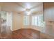 Bright dining room features wood floors, plantation shutters, and neutral walls at 1417 E Marshall Ave, Phoenix, AZ 85014