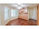 Bright dining room boasts wood floors, plantation shutters, and built-in cabinets at 1417 E Marshall Ave, Phoenix, AZ 85014