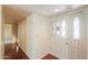 Inviting entryway featuring a decorative front door and wood floors at 1417 E Marshall Ave, Phoenix, AZ 85014