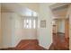 Inviting entryway features wood flooring and a decorative glass front door at 1417 E Marshall Ave, Phoenix, AZ 85014