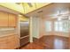 This kitchen features stainless steel appliances, light wood cabinets, and lots of countertop space at 1417 E Marshall Ave, Phoenix, AZ 85014