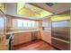 Updated kitchen featuring stainless steel appliances, wood floors, and plenty of storage at 1417 E Marshall Ave, Phoenix, AZ 85014