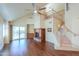 Bright living room features wood floors, fireplace, and staircase to the second floor at 1417 E Marshall Ave, Phoenix, AZ 85014