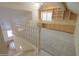 View of the carpeted loft with built in storage and desk space at 1417 E Marshall Ave, Phoenix, AZ 85014