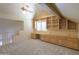Loft featuring built in cabinets and a desk, perfect for an office or play area at 1417 E Marshall Ave, Phoenix, AZ 85014