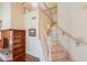 View of the staircase with wood steps and banister at 1417 E Marshall Ave, Phoenix, AZ 85014