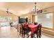 Open-concept living and dining area offering easy access to the kitchen for seamless entertaining at 1619 E Aspen Ave, Buckeye, AZ 85326