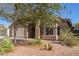 Well-maintained home with desert landscaping in the front yard at 1619 E Aspen Ave, Buckeye, AZ 85326