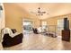 Spacious living room with access to outdoor patio, offering bright and airy living space at 1619 E Aspen Ave, Buckeye, AZ 85326