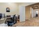 Home office with a comfortable chair and lots of open space at 1619 E Aspen Ave, Buckeye, AZ 85326